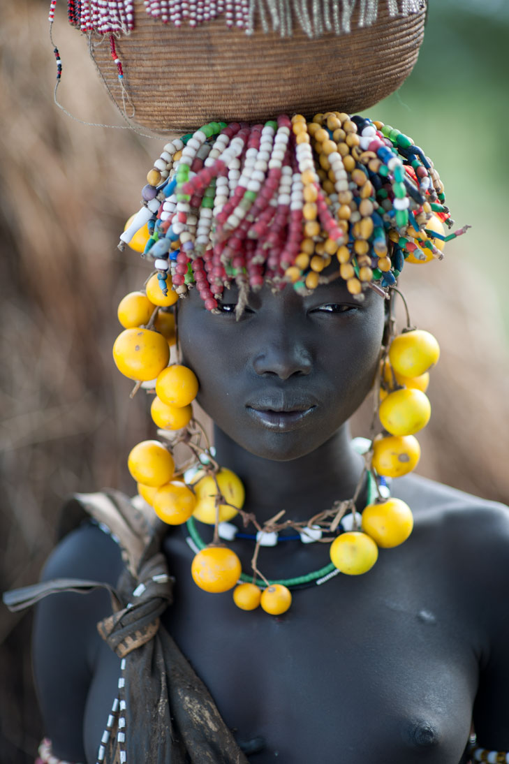 Young Mursi tribal woman